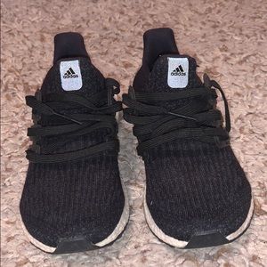 Lightly worn black and white ultraboost